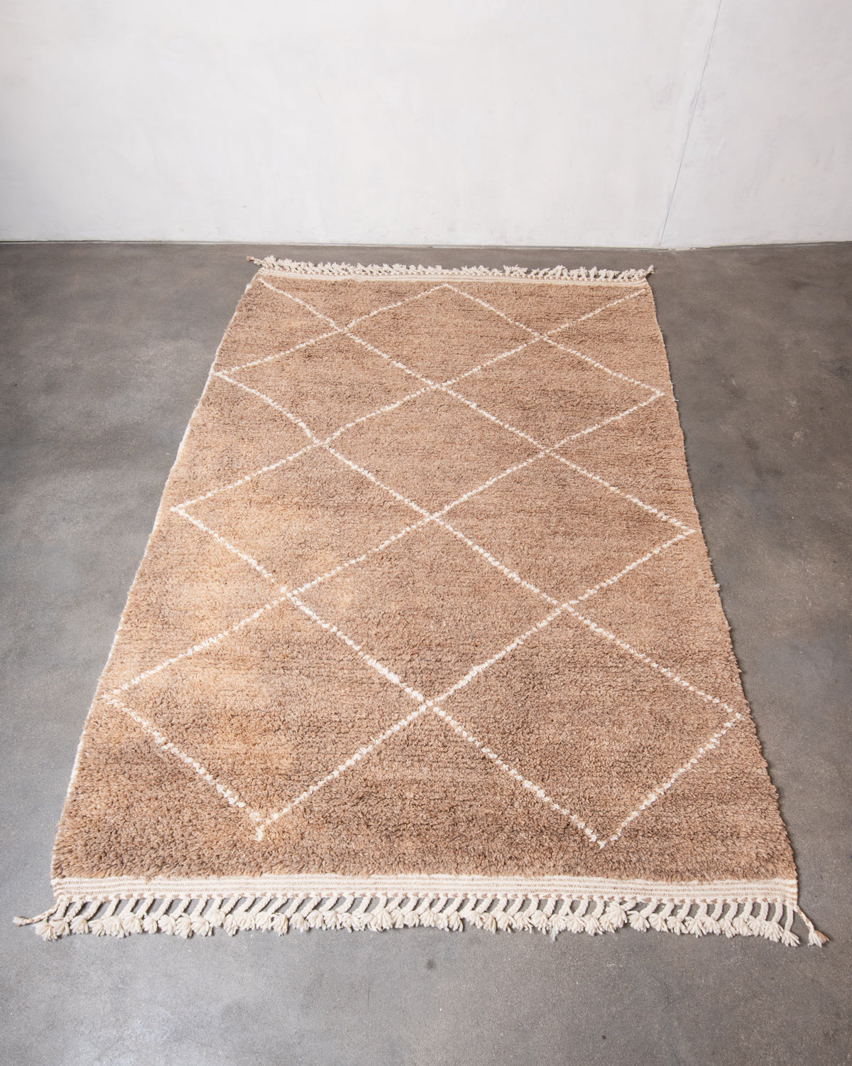 Modern, designer, handcrafted Berber rug from Morocco. Beniourain carpet with beautiful colours and patterns and fluffy wool texture.